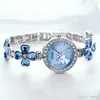 Femme Fashion Clover Robe Watches Bracelets en acier inoxydable Couleur étudiante Bracelet Blue Righestone Quartz Watch Lovers Girl Gift Shell Dial 290W