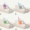 Keychains Lonyards Mini Luminous Fruit Bubble Tea tasse Keetchain Womens Sac Mignon de simulation Toy Pendant Sac décoratif créatif DIY CADEAU Q240429