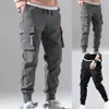 Autumn Men Pants Hip Hop Harem Joggers Pants Mane Trousers Mens Mens Solid Multi-Pocket Cargo Pants Skinny Fit Sweatpants 240429