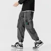 Streting da jogger da uomo da uomo più dimensioni da uomo hip hop streetwear multipli tasche allungate pantaloni in denim in cotone pantaloni larghi 8xl 240424