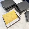 Porte-cartes d'identité de crédit de créateur portefeuille en cuir en peau de mouton Sacs d'argent à carte à carte à carte pour hommes Fashion Mini Cards Sac Coin Purse avec boîte 240415