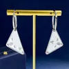 Brincos de garanhão preto da marca feminina Triângulo Triângulo Longo Tassel Prad Cadeia Dangle Drop Ear Gold Eardrop Earingings Designer para Mulher Luxury Jewelry Gift 45