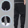 Calça masculina homens homens elásticos elásticos casuais Lápis de tamanho Oversize ao ar livre calça esportiva masculino Spring outono solto de pista de moletom de corrida solta