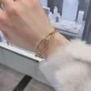 Swarovskis Bracelet Designer Women Oorspronkelijke kwaliteit Luxe mode -armband In elkaar grijpende dubbele lus vergrendeling Bracelet Dames persoonlijkheid Ovale gesp armband
