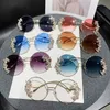 Lunettes de soleil de créateurs nouveaux bords coupés sans cadre avec lunettes de soleil incrustées en diamant des lunettes de soleil circulaires à mode