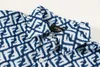 Summer Men's T-Shirt Designer Button Impresso Cardigan Silk Manga curta Top de alta qualidade A moda de camisa de natação masculina série de praia Tamanho Europeu M-3xl RE02