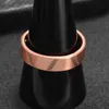 Полосовые кольца ретро V-образное магнитное красное медное открытое кольцо, используемое для лечения бессонницы и потери веса у обоих женщин.Энергетические украшения Q240429