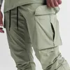 Pantalon pour hommes coulant pantalon pour hommes mince pantalon de sport de soie de glace avec plusieurs poches pour sécher et jogging