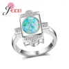 Rings Cluster Design unico Round Blue Fire Opal Stone 925 Sterling Silver Silver Silver Luxury Zirconi Women Wedding Promise