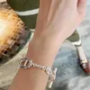 Designer -Armband Brandneuexplosionen Ladies Hanqing New Mode Pendler Kupfer plattiert Platin -Schwein Nase Ovales Etikett Armband Beliebtes leichte Luxushandwerk