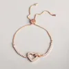 Swarovskis armband designer kvinnor original kvalitet lyx mode armband hjärtmatchande hjärtformad dragande diamant inlagd hjärtformad ringspänne armband