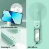 Elektrische ventilatoren Nieuwe handheld kleine ventilator draagbare creatieve mini drie versnellingen verstelbare vaste kleur opladen gevouwen ventilator led -verlichting telefoonhouder D240429