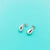 Fashion Simple Ttifeeny Moucles d'oreilles polyvalentes Bull Horn Golden Droplet Feme Crowd Design haut de gamme Cold Cold Temperament Temperament Ear Bijoux