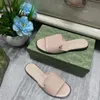 Summer Nuovi pantofole femminili da donna Piattificazione piatta Rinestesone Design del pulsante Apri Flip Flops Materiale in pelle comodo sandali da spiaggia non resistenti all'usura non slittata 2024