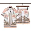 Męskie letnie designerskie koszule Hawaje kwiatowy nadruk swobodne koszuli mężczyźni kobiety szczupłe ubrania na plażę z krótkim rękawem