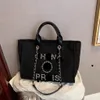 Sacs de plage de mode classiques de luxe Étiquette fourrelle Perle Sof Portable grande capacité Designer Canvas Handbag Brand Femme Sac à main