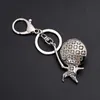 Keychains Lanyards Creative Sports Fence Villain Metal Skull Keychain Bag Keychain Pendant Fencing Club Mens Keychain Classic Jewelry Gift Q240429