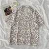 Chemise de plage hawaïenne imprimée de chemisiers pour femmes pour hommes Summer Summer Shirts Aloha Vêtements de vacances Vêtements de vacances Chemise 2024