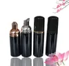 Botellas de almacenamiento 100pcs 60 ml de bomba de espuma de plástico negro botella de la cara vacío pestañas limpiador jabón cosmético dispensador de espuma SN301