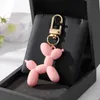 Fashion Cartoon Animal Couple Kelechains Balloon Dog Key Ring Femme Men Bling Bling Pet Pet Sag Car Holder AirPods Box Boîte Bijoux Ami Cadeau
