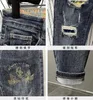 Zerrissen mit Druckjeans für Männer gebrochene Grafiklöcher Hosen lässige weiche Kpop Stylische reguläre Goth Baggy Herren Cowboyhose 240426