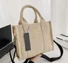 Designerka torba na torbę designerską torba na płótnie 27 cm na zewnątrz torba plażowa portfela na ramię Crossbody Worka Moda Wysokiej jakości torebka torba na ramię