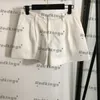 Ves vestes de cou short coeur bouton gilets pantalon ensemble blanc sans manche pantalon de luxe de personnalité de personnalité