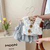 Roupas Conjunta de verão do bebê Conjunto de verão da moda coreana Floral Sling Top Top fofo shorts de duas peças de duas peças 2024