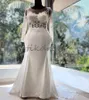 Robes de mariée de sirène de luxe 2024 Appliques d'illusion en dentelle Lace Lace Sobre Bridal à manches longues pour femmes noires