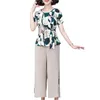 Kvinnors tvådelade byxor Tvådelar Top Set Floral Print Outfit med snörning Detalj O Neck T-shirt Bred ben Mid-Aged Mom