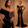 2024 Black Mermaid Prom Dresses Sexy Crystal Sequined Prom Gowns One Shoulder Long Sleeves Sheer Side Split Formal Evening Dress Hollow Back