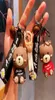 Projektant Sneaker Skórzane breloki silikonowe Netto popularny Big Bear Doll Cartoon Cartoon Rope Cute Key Key Bejdia Women039s S5273897