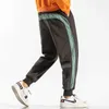 Pantalon masculin 2021 Pantalon de sport à rayures Side pour hommes Nouveaux pantalons de jogging pour hommes à la mode