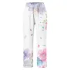 Pantalon féminin lin en coton blanc pour femmes 2024 mode floral imprimé à la taille élastique de taille avec des poches pantalon de jambe large