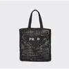 Hindistan cevizi fiber tote çanta tasarımcı çanta saman çanta plaj çantası moda örgü içi boş yazma çantası için siyah kayısı dokuma çanta tatil çantası büyük kapasiteli alışveriş çantası