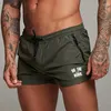 Pantalones cortos para hombres Tabla de playa informal de verano de baño para hombres Policita de cremallera de gimnasio de Surf Fitness
