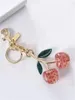 Belangrijkste ringen COA CH Cherry Keychain Bag Charm Decoratie Accessoire Pink Green High Quality Design 231218