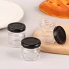 Bouteilles 2pcs mini-verre en verre miel ensemble petit avec couvercle adapté aux cadeaux de bébé mariages et bocgans de fêtes