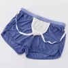 WJ Sexy Sleep Bottoms Men Shorts Ice Silk Mesh Ademende ondergoed Boxers Transparante slijtage 240419