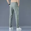 Pantaloni maschili oussyu Nuovo uomo primavera/estivo maschile ultra sottile elastico di moda dritto elastico jogging 28-38 q240429