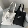 Evening Bags Letter Canvas Bag 2024 Black And White Minimalist Casual Cloth For Men Women Snack Shopping Thickened