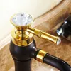 Rubinetti del lavandino da bagno a foro singolo tocco nero rubinetto cucina tubo rossa bacino rotola miscelatore bianco rame rubinetti oro