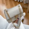 Sac 2024 Fashion Luxury Femmes en cuir Striped Shiped Clutch Clatest Dames Casual Travel Crossbody Bands Messenger