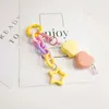 Keychains Lonyards coloré coeur cardiaque pendentif pendentif bijoux joelry coréen féminin étoiles chaînes clés décoration anneau sur sac bifère de fête féminine cadeau Q240429