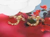 2022 Diseño hueco de pendiente de encanto de alta calidad con diamante colorido de cuentas rojas para la participación de las mujeres en el chapado de oro de 18k tiene stam9242031