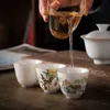 9 pezzi/set di tè in ceramica cinese set squisito fiore dipinto a mano e motivi per uccelli Tecinetto in porcellana Teacut per tè fatti a mano 240428