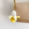 Keychains Lanyards Cartoon Plush Banana Keychain Backpack Hair Cute Banana Pendant Female Childrens Toy Doll Keychain Car Keychain Gift Q240429