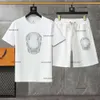 مصمم مجموعة رجال Tracksuit Mens T-Shirt مكون من قطعتين ، سروال شورت سراويل شورتات ، شعار أزياء الملابس الرياضية Tshirt بنطلون قصير 2pcs 29 أبريل