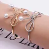 Wedding Armbanden nieuwe bruiloft sieraden eenvoudige koperen giet knoop open metalen bangle armband schattige gesimuleerde parel vlinder verstelbare armbanden cadeau