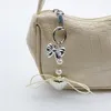 Keychains Mode Keychain Earphone Hülle Anhänger Metallschlüsseldekoration Keyring -Legierung Material Perfekt für und Handtaschen